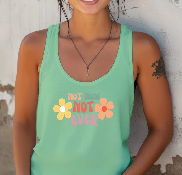 Hey ladies! Add a splash of fun, sass, and inspiration to your wardrobe with our retro-style floral racerback tank! Perfect for those who adore vibrant floral designs and uplifting quotes, this tank features a beautiful vintage flower pattern paired with a smart, motivating phrase.