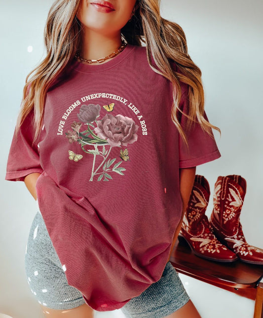 Comfy Love Blooms Unexpectedly Like A Rose T-shirt with White Lettering