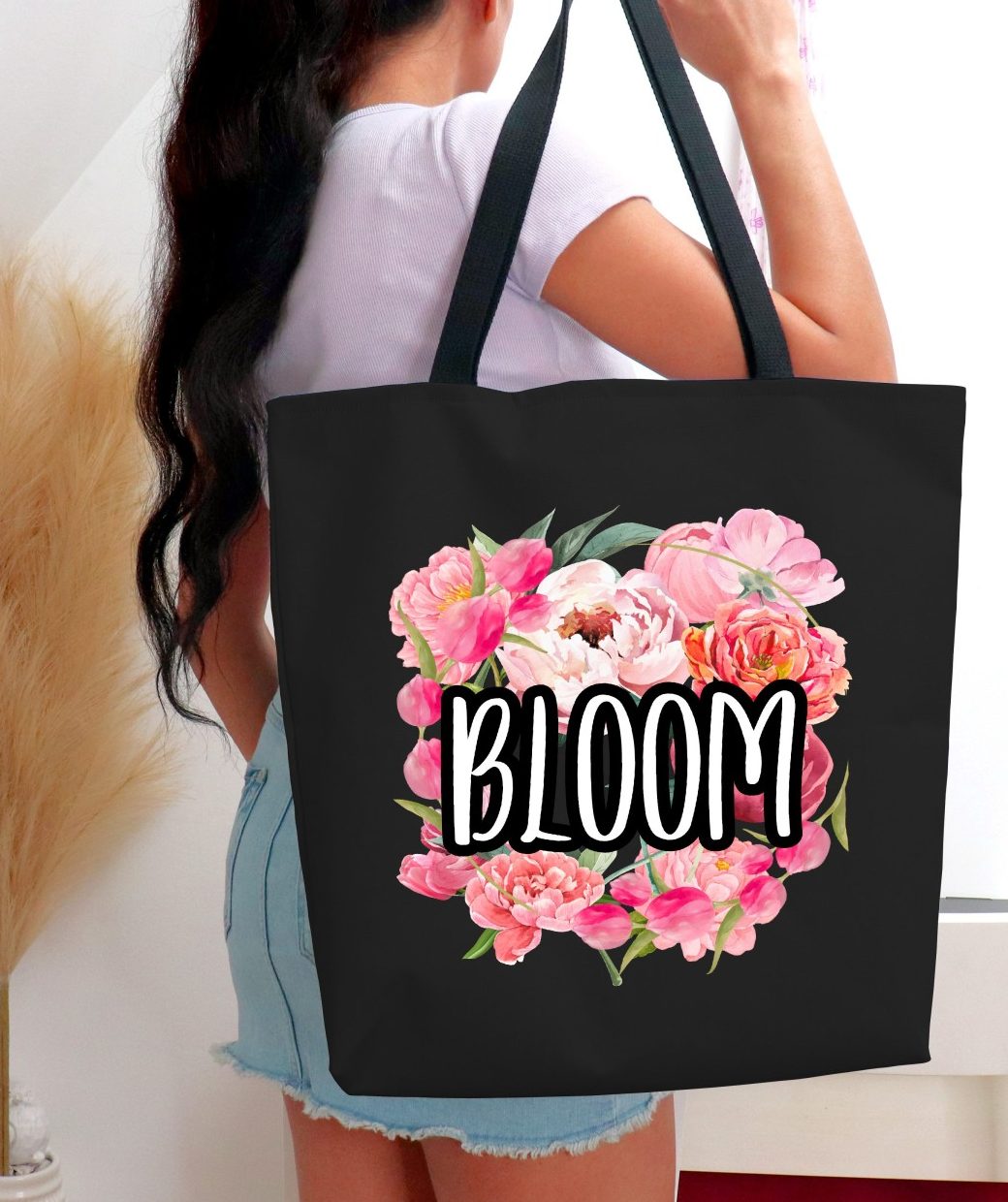 Brighten your day and your style with our high-quality cotton tote bag, featuring a stunning bouquet of pink peonies and tulips paired with an inspirational quote! This chic and durable bag is perfect for carrying your essentials while adding a touch of romance and femininity to any outfit.