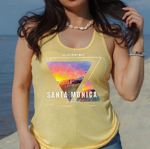 Transform your summer wardrobe with our high-quality Women's Tank, showcasing the iconic Santa Monica Beach Pier at sunset. This tank perfectly captures the vibrant hues and serene beauty of the California coast, making it an ideal choice for beach outings, casual hangouts, or even a laid-back evening out. The soft, breathable fabric ensures all-day comfort, while the stunning sunset print adds a touch of coastal charm to any outfit. Embrace the spirit of beautiful Santa Monica and let the sunset follow you